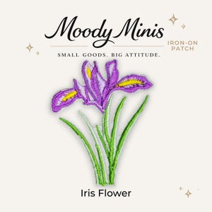 May include: An embroidered iron-on patch featuring a purple iris flower with yellow accents and green stems. The text Moody Minis, Small Goods. Big Attitude., and Iris Flower is printed above and below the patch with small star icons.
