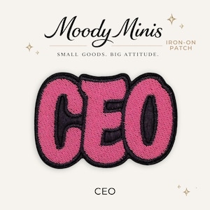 May include: An iron-on patch featuring the word CEO in bold, bubble-style lettering. The letters are embroidered in bright pink thread with a thick black outline, creating a raised, textured appearance against the background of the patch.