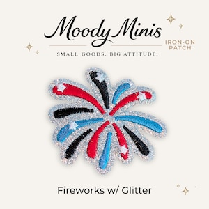 May include: An iron-on patch featuring a firework design with red, black, and blue embroidered rays on a silver glitter background. The text Moody Minis, Small Goods. Big Attitude., Iron-On Patch, and Fireworks w/ Glitter are visible.