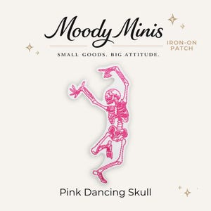 May include: An iron-on patch featuring a bright pink embroidered skeleton in a dancing pose. The text Moody Minis, Small Goods. Big Attitude., and Pink Dancing Skull is printed around the patch. The skeleton has raised arms and bent legs.