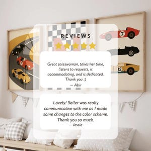 May include: Three framed prints featuring vintage race cars in red, black, and yellow. One print shows a race track with cars. The other prints display individual cars with numbers. The word "REVIEWS" is visible.