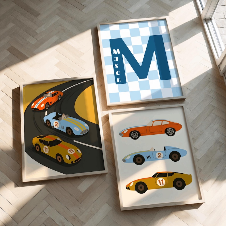 May include: Three framed wall art prints. One features a large blue letter M with the name Mason and a light blue checkered background. Another shows three race cars on a track. The third displays three race cars in a vertical row.