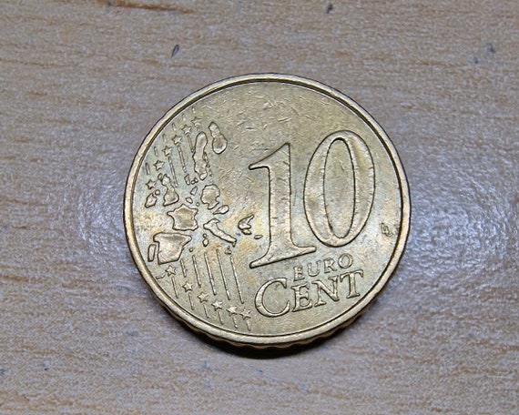 フランス10セント硬貨（西暦1999年もの）。 フランス10セント硬貨（西暦1999年もの）。