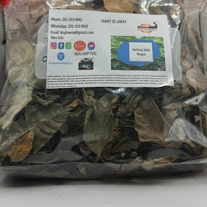 May include: A clear plastic bag filled with dried herbs and leaves. The bag has a label that says "Herbing bath Bengen" and "Keptoway". The label also includes contact information and social media icons.