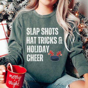 Comfort Colors Hockey Christmas Sweatshirt, Slap Shots Hat Tricks & Holiday Cheer Shirt for Hockey Lover, Hockey Mom Dad Sweatshirt, Hockey