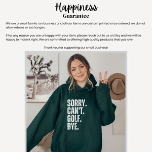 May include: A dark green hooded sweatshirt with the text "SORRY. CAN'T. GOLF. BYE." printed in white on the front.