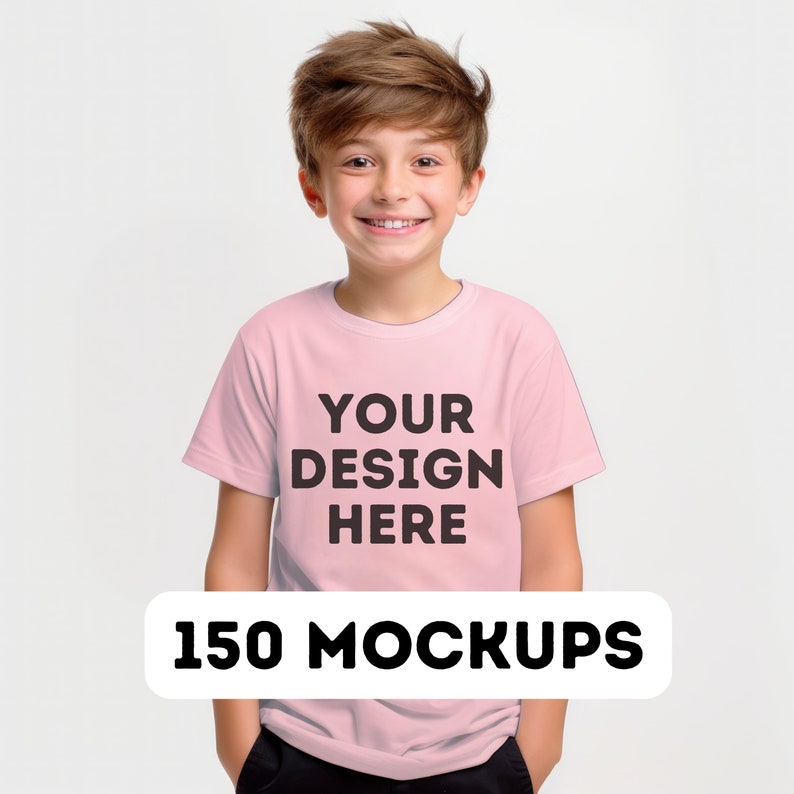 May include: A young person wearing a pink t-shirt with the text "YOUR DESIGN HERE" printed on the front. The t-shirt is a mockup for a design.