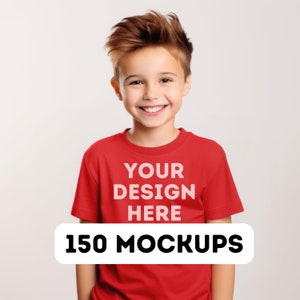 May include: A young person wearing a red t-shirt with the text "YOUR DESIGN HERE" printed on the front. The text is in a white font. The person is smiling and looking at the camera. 150 MOCKUPS.