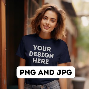 May include: A woman wearing a navy blue t-shirt with the text "YOUR DESIGN HERE" printed in white. The text is centered on the shirt. The image is labeled "PNG AND JPG" in a white rectangle.