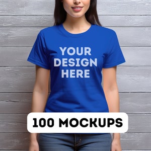 May include: A woman wearing a blue t-shirt with the text "YOUR DESIGN HERE" printed on the front. The t-shirt is a mockup for a design project.