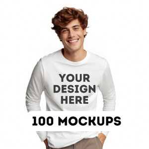 May include: A white long-sleeve shirt with the text "YOUR DESIGN HERE" printed on the front.  100 MOCKUPS.