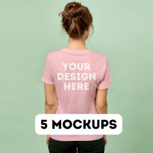 May include: A pink t-shirt with the text "YOUR DESIGN HERE" printed on the back.