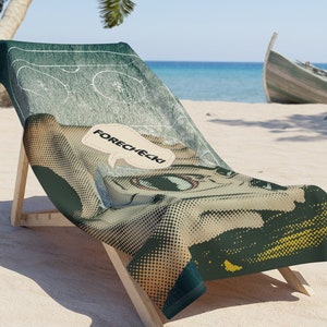 May include: A beach towel with a green, yellow, and black design featuring a hockey player with a speech bubble that says "FORECHECK".