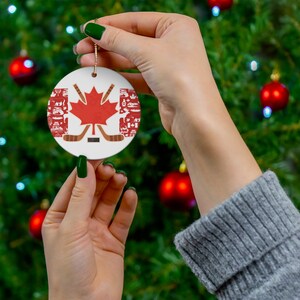 Hockey Ceramic Circle Ornament, Canadian Maple Leaf Symbol & Hockey Sticks, Hockey Home Decor, Hockey Holiday Ornament, Christmas Present