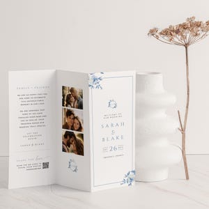 May include: A wedding invitation with a blue and white floral design. The invitation includes the names Sarah and Blake, the date August 26th, and the location Provence, France.