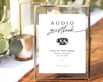 May include: A gold-framed sign with the text "AUDIO guestbook" and a vintage phone icon. The sign also includes the text "PICK UP THE PHONE LEAVE A MESSAGE AT THE TONE" and the names "SARAH & BLAKE" with the date "10.12.XX".