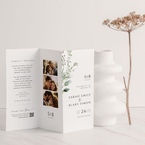 May include: A wedding invitation with a watercolor floral design. The invitation features the names "Sarah Emily & Blake Simon" and the date "Sat 26 Aug". The invitation also includes a QR code to share photos.