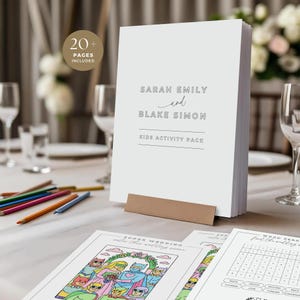 May include: A white Kids Activity Pack with the names Sarah Emily and Blake Simon printed on the front. The pack includes 20+ pages and is displayed on a table with coloured pencils and activity sheets.