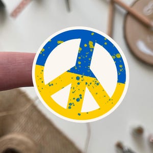 Pegatina con la bandera de Ucrania y el símbolo de la paz, vinilo azul y amarillo, en apoyo a Ucrania