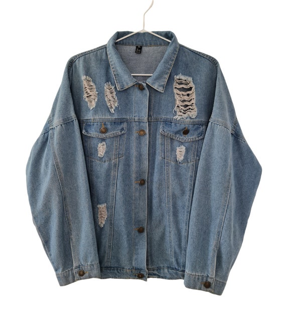 Blue ripped denim jacket hotsell