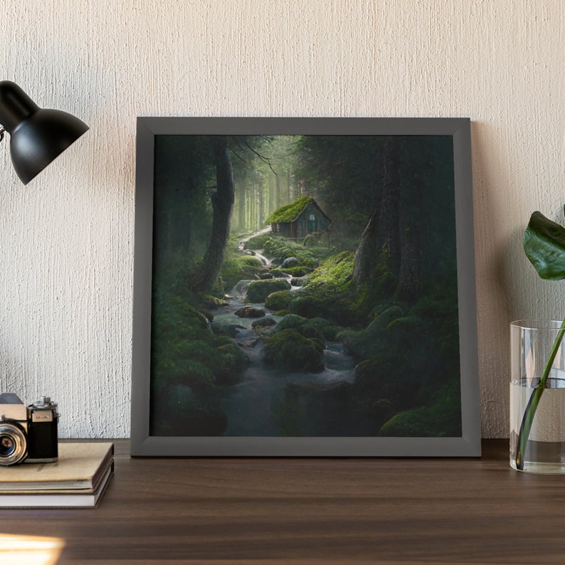 May include: A framed photograph of a small wooden cabin nestled in a lush green forest. A stream flows through the forest, with moss-covered rocks and trees surrounding the cabin.