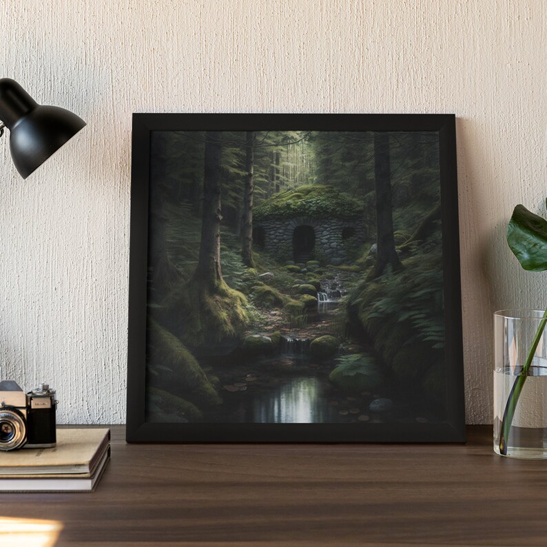 May include: A framed print of a mossy stone structure in a dark forest. The structure has a small opening and is surrounded by lush greenery. A stream flows through the forest, creating a peaceful and mysterious atmosphere.