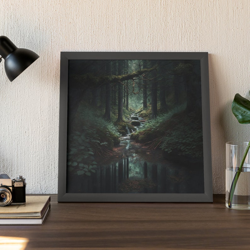 May include: A framed photograph of a forest scene with a small stream running through it. The stream is surrounded by lush green foliage and the trees are tall and dark.