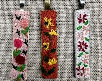 Hand Embroidered necklaces.
