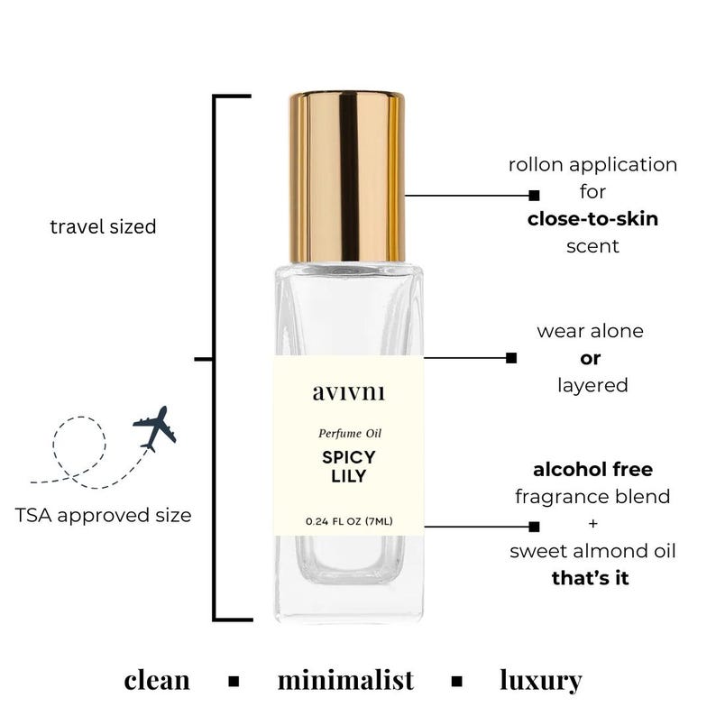 May include: A small perfume oil bottle with a gold cap and a clear glass body. The label says "SPICY LILY" and "0.24 FL OZ (7ML)". It has a roll-on applicator and is alcohol-free. The design is clean, minimalist, and luxurious, and travel-sized.