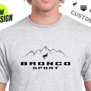 May include: A handmade wooden sign with the text "Welcome to our home" in a handwritten style. The sign is painted white with black lettering and a distressed finish, perfect for farmhouse decor.