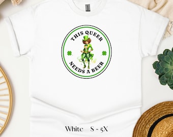 This Queer Needs a Beer - LGBTQ Gay Pride T-Shirt, Funny St. Paddys Day Tee, Lesbian Drinking Shirt, Gift for Her Him, Lucky Shirt
