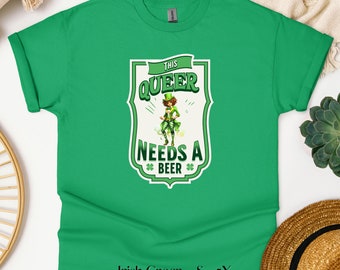 This Queer Needs a Beer - LGBTQ Gay Pride T-Shirt, Funny St. Paddys Day Tee, Lesbian Drinking Shirt, Gift for Her Him, Lucky Shirt