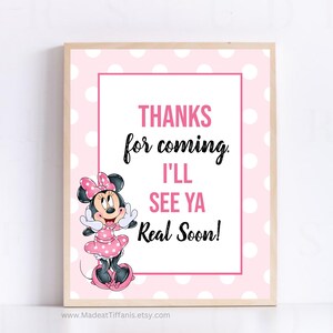 May include: Pink and white polka dot sign with a cartoon image of Minnie Mouse. The sign says "Thanks for coming. I'll see ya real soon!"