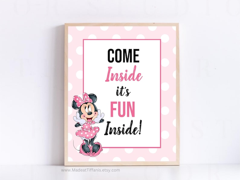 May include: Pink and white polka dot sign with a cartoon image of Minnie Mouse. The sign says "Come Inside it's Fun Inside!"