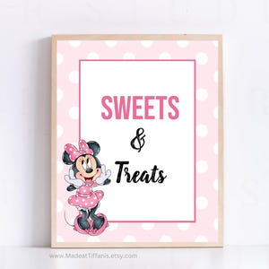 May include: Pink and white polka dot sign with a cartoon image of Minnie Mouse. The sign says "Sweets & Treats".