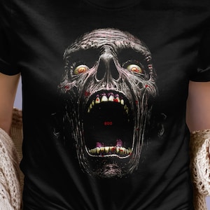 Zombie monster illustrated t-shirt, perfect gift Halloween features a screaming ghoul coming out of the shadows with a nightmarish grimace