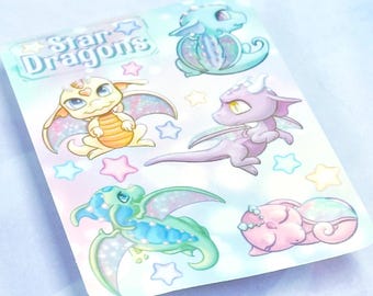 May include: A sheet of colorful stickers featuring five cartoon dragons with sparkly wings and the text "Star Dragons".