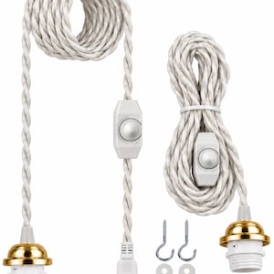 May include: Two white twisted fabric pendant light cords with gold-tone metal sockets, integrated rotary dimmer switches, and standard two-prong plugs. Includes two metal screw-in hooks and two white plastic cable management clips.
