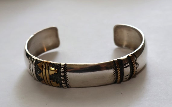 Sold Original Tommy Singer Engraved Sterling Silver - Navajo