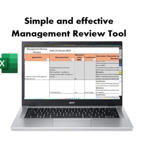 May include: A laptop computer displaying a spreadsheet with the title "Management Review Minutes" and the date "15 January 2024". The spreadsheet is divided into columns with headings such as "Agenda Item", "Discussion Point", "Discussed at this Meeting", "Lead Person", and "Information/Preparation required for Attendees".