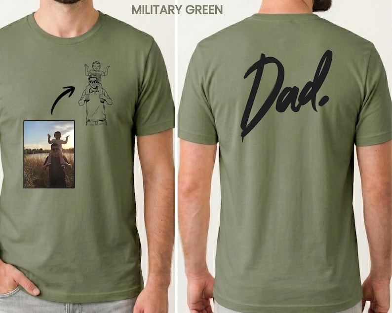 May include: A military green t-shirt featuring a custom line art illustration of a person carrying a child on their shoulders on the front, alongside a small photographic reference. The back of the shirt displays the word Dad in black script.