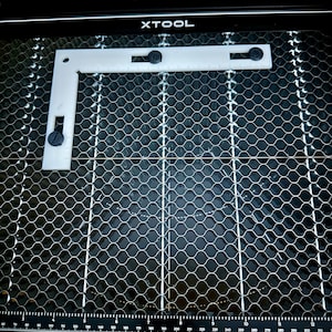 Xtool M1 honeycomb positioning square / plus holder. Digital stl files only.