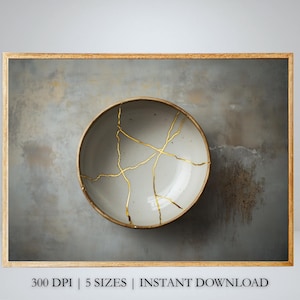 Puede incluir: Impresión enmarcada de un cuenco gris claro con líneas doradas, que representa el arte japonés Kintsugi. El cuenco está centrado sobre un fondo gris texturizado, con un marco dorado. El texto en la parte inferior dice "300 DPI | 5 TAMAÑOS | DESCARGA INSTANTÁNEA".