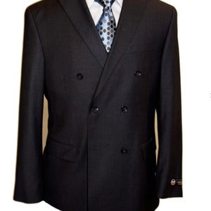 May include: A black double-breasted suit jacket with a black and white patterned tie.