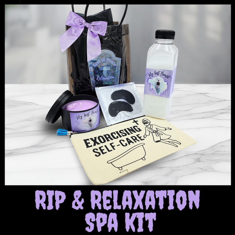 May include: A spa kit with a black gift bag tied with a purple bow, a candle, a bottle, eye masks, and a canvas pouch. The pouch reads "Exorcising Self-Care". The kit includes the text "Rest in Peace & Relaxation" and "My best Boy".