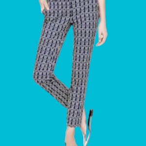 May include: Blue and white patterned pants with a cropped length.