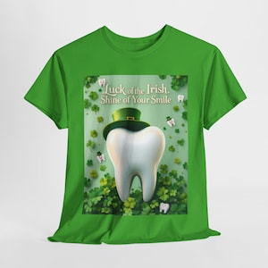 May include: Green t-shirt with a white tooth wearing a green leprechaun hat. The tooth is surrounded by shamrocks and the text "Luck of the Irish. Shine of Your Smile."