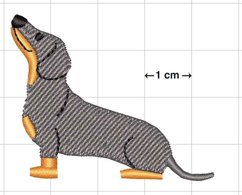 May include: Embroidered design of a gray dachshund dog with orange paws, looking up, on a white grid background with a scale bar indicating 1 cm.