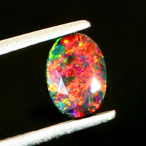 AAAAA Grade Natural Black Opal Cabochon Gemstone+Welo Fire Black Opal+ Faceted Oval Shape Opal+October Birthstone Gemstone, Size 7x5 MM. image 2