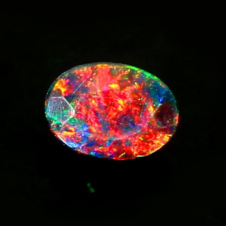 AAAAA Grade Natural Black Opal Cabochon Gemstone+Welo Fire Black Opal+ Faceted Oval Shape Opal+October Birthstone Gemstone, Size 7x5 MM. image 1